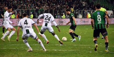 a group of men playing football