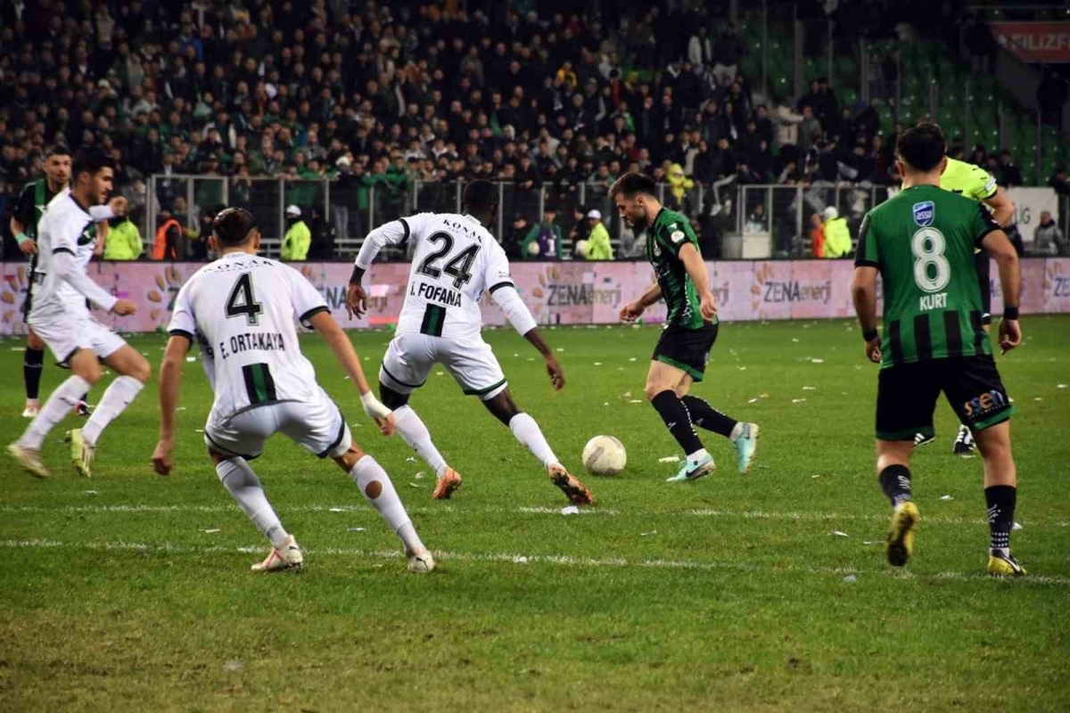 a group of men playing football