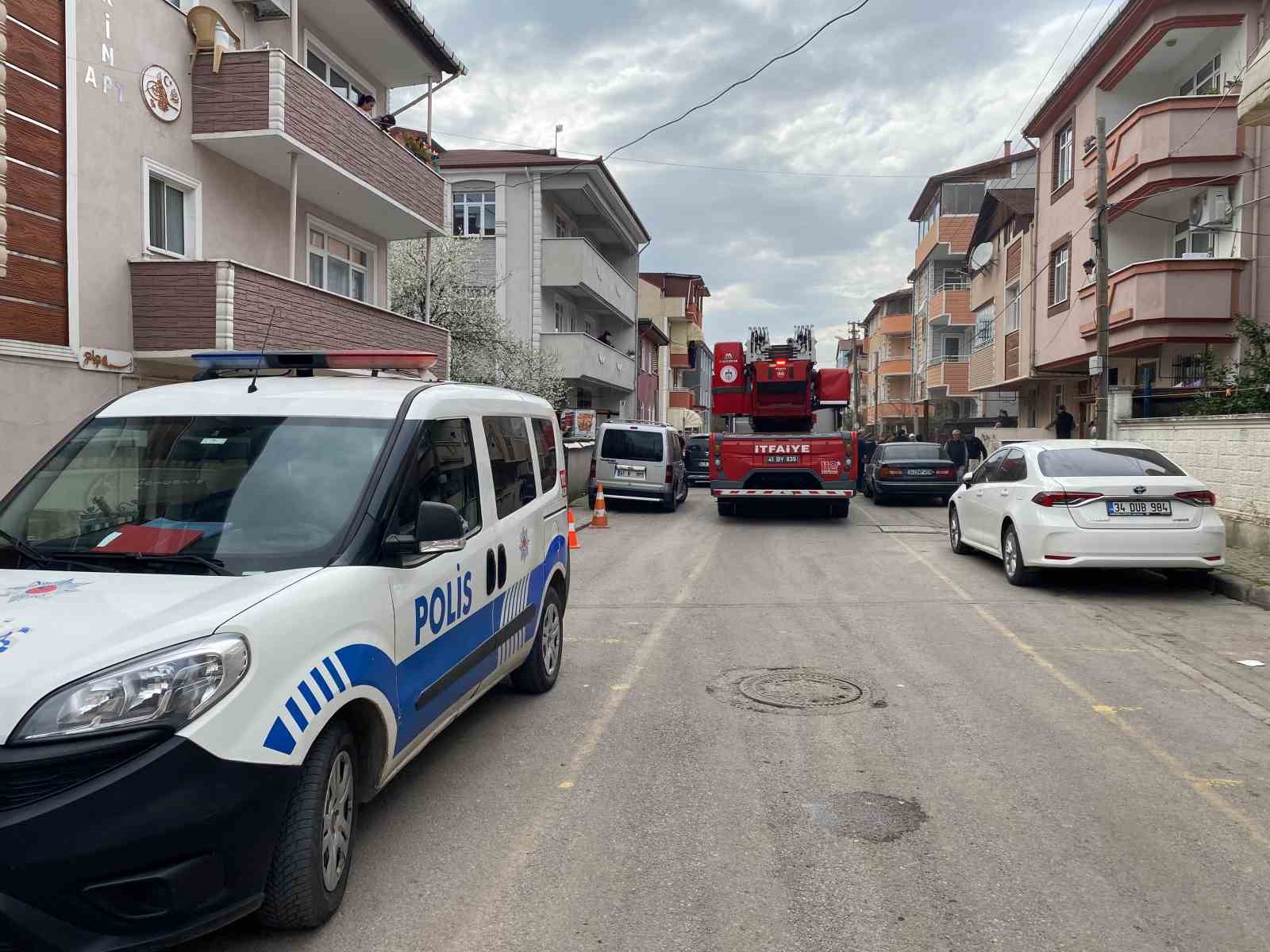 a police car and a fire truck on a street