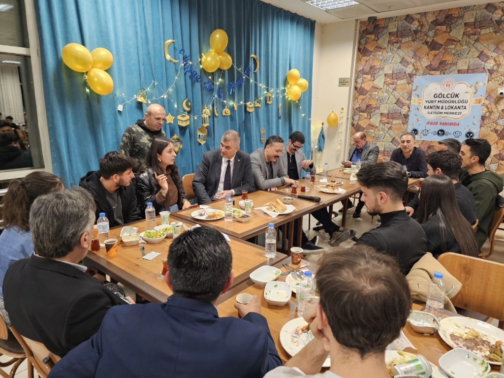 a group of people sitting around a table