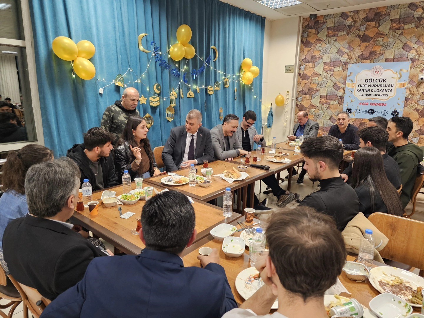 a group of people sitting around a table
