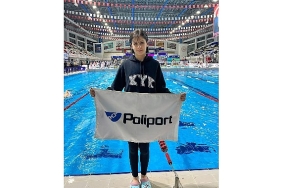 poliport-basariya-giden-yolda-genc-sporcularin-yaninda-h841BIXZ.jpg